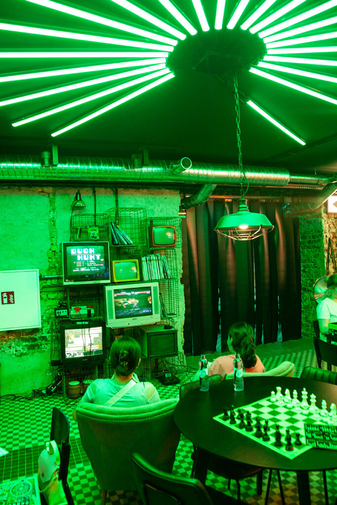 H.4.0.S warsaw bar game gaming chairs industrial decor computers modern neons green interior chess