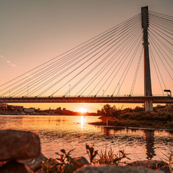 poniatowski bridge wisła vistula river city centre orange warsaw sunset